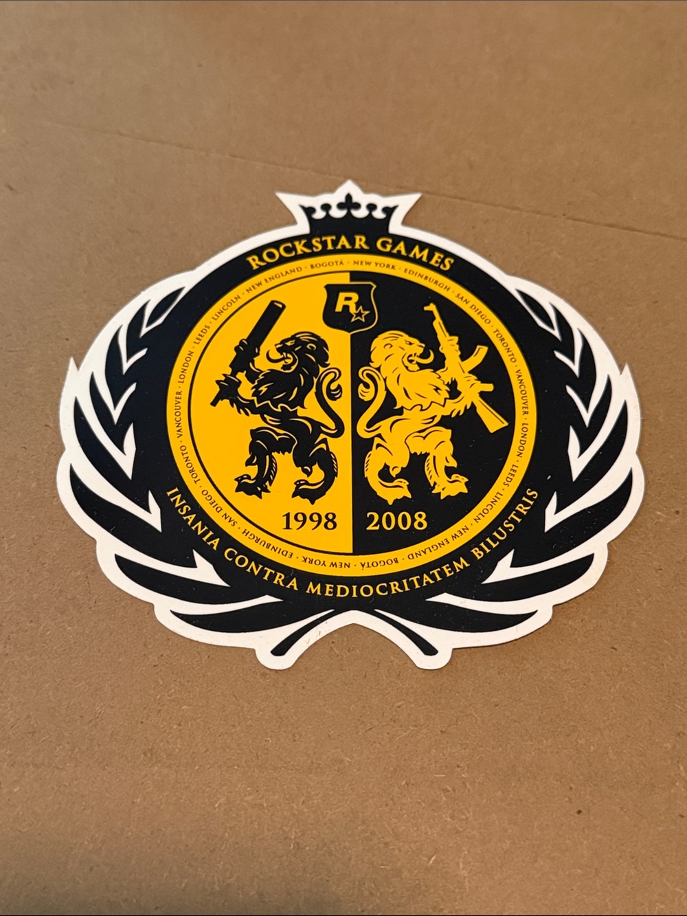 ROCKSTAR GAMES 10 year anniversary Black and Yellow Emblem Sticker